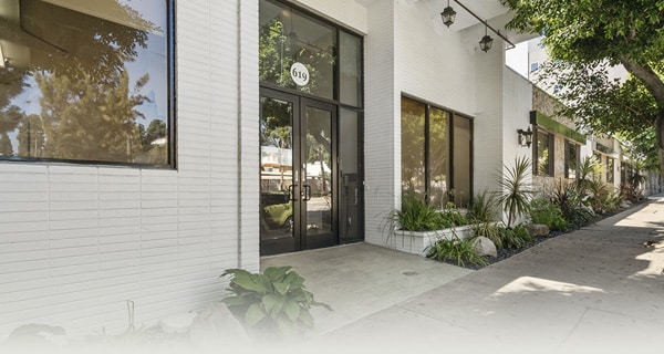 the front glass door entrance of the Kennedy Care facility